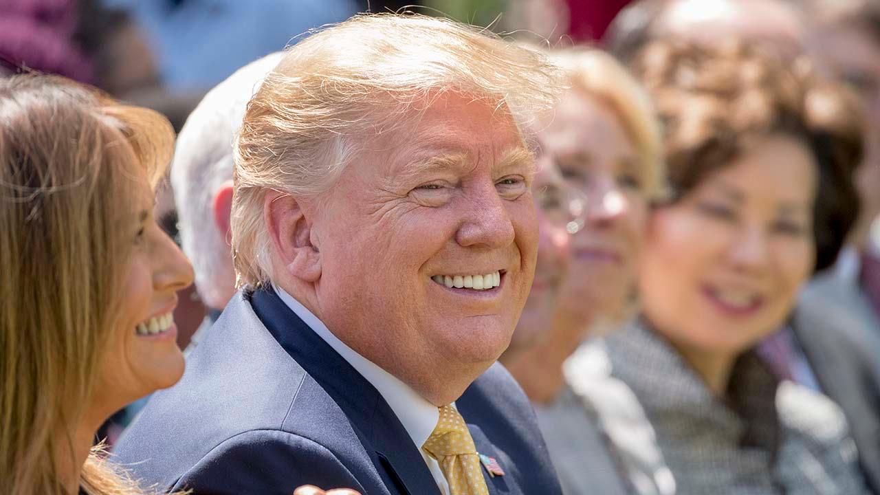 Crowded 2020 presidential field faces rising Trump approval rating