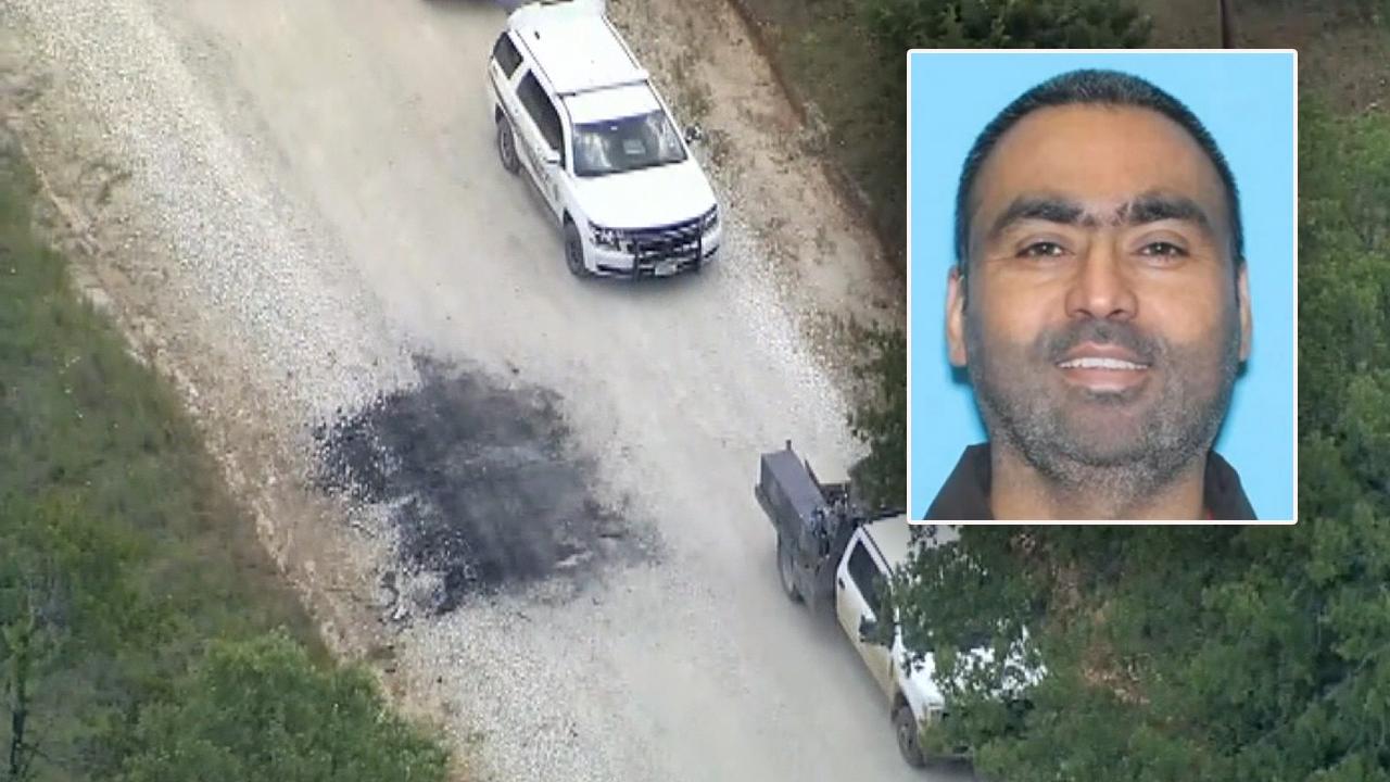 Body of double murder suspect discovered the day after his children were found dead inside a burning car 