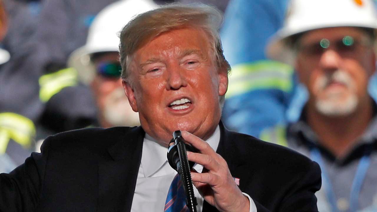President Trump downplays tit-for-tat tariff hikes with China