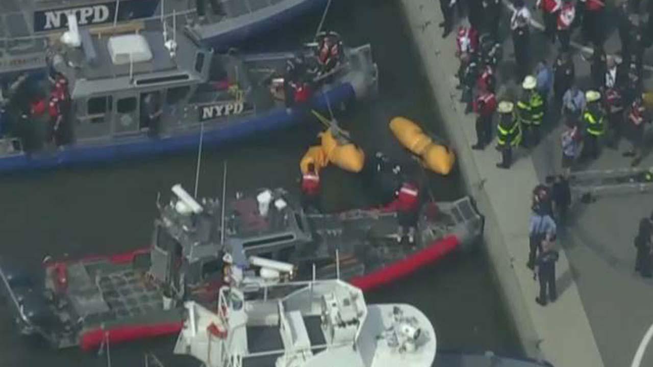 Pilot pulled to safety after helicopter crashes in Hudson River