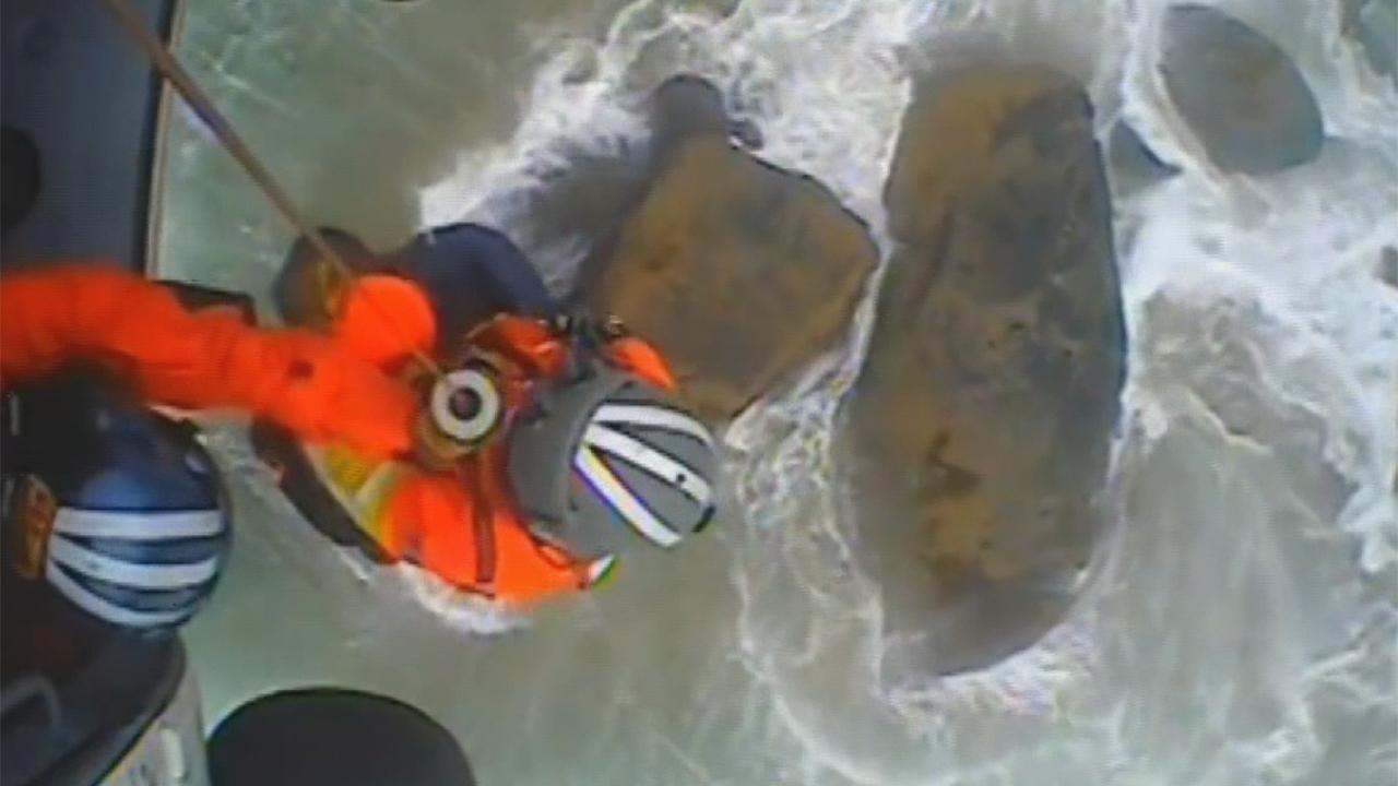 Coast Guard saves couple trapped by rising tide and battered by waves on Oregon shoreline