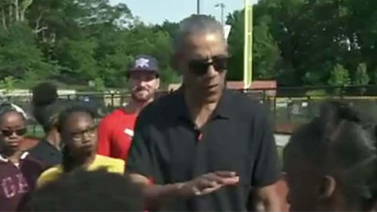 Former President Obama surprises young baseballs players at the Washington Nationals Youth Baseball Academy