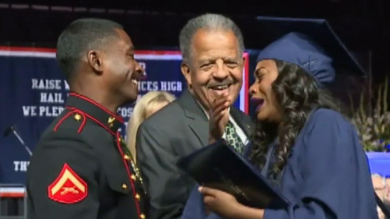 Marine surprises little sister at her high school graduation