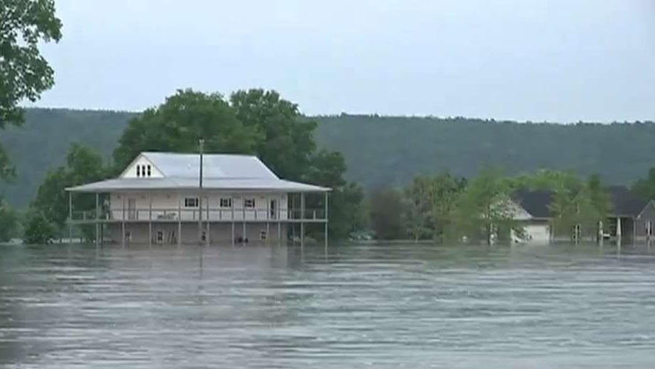 Forecasters predict more rain amid historic flooding along Arkansas River
