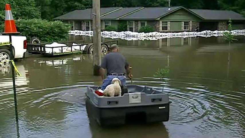 Arkansas braces for more flooding as high water moves south with more rain in the forecast
