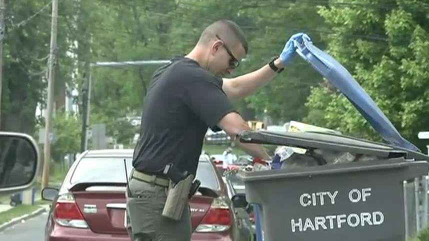 Connecticut investigators seen sifting through Hartford waste facility