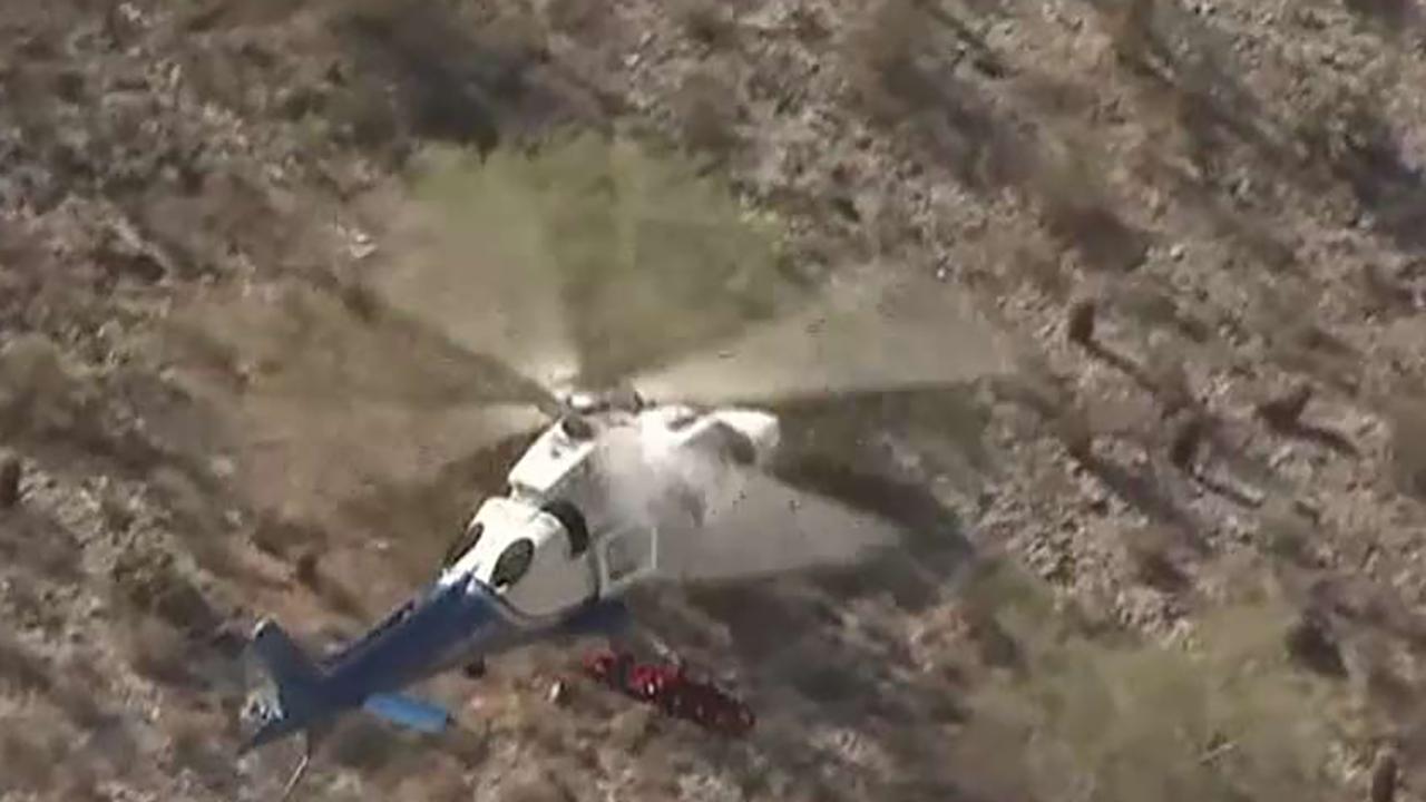 Helicopter rescue gurney spins out of control while rescuing injured hiker