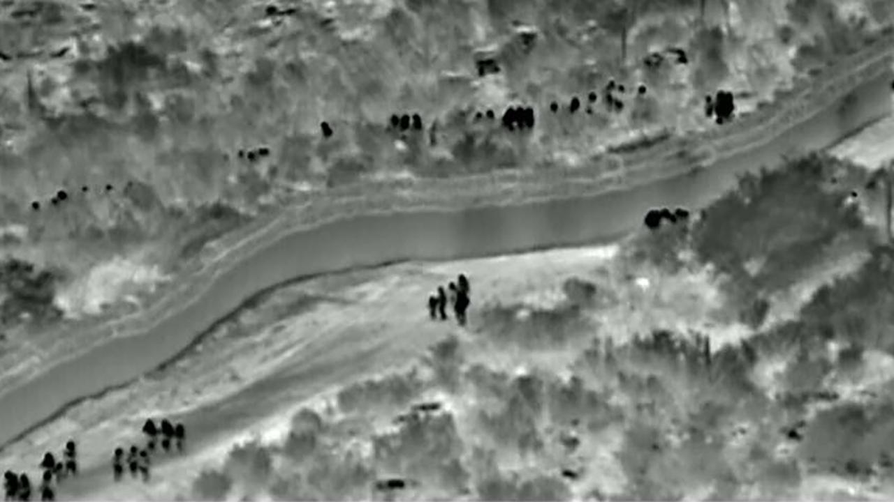 CBP releases video showing 134 migrants walking around an unfinished border fence