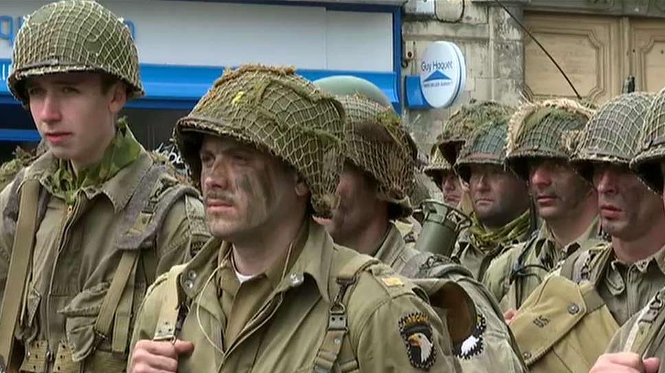 D+1: Soldiers from 101st Airborne Division re-enlist at site of famous Battle of Carentan