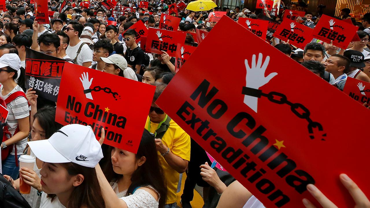 Massive protests in Hong Kong as crowds rally against China extradition bill