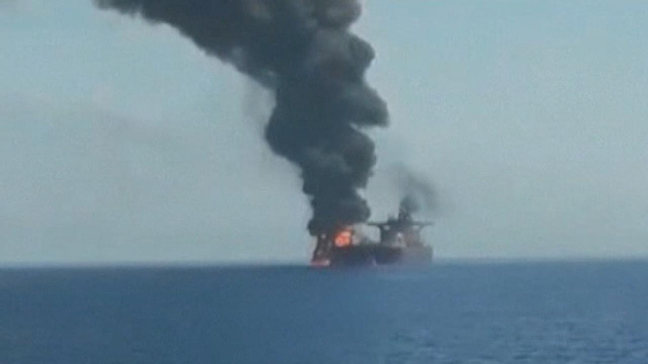 Oil tanker damaged in suspected attack burns in the Gulf of Oman