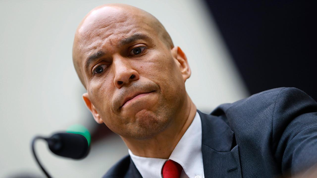 Cory Booker says he won't apologize to Joe Biden for criticism on segregationist comment