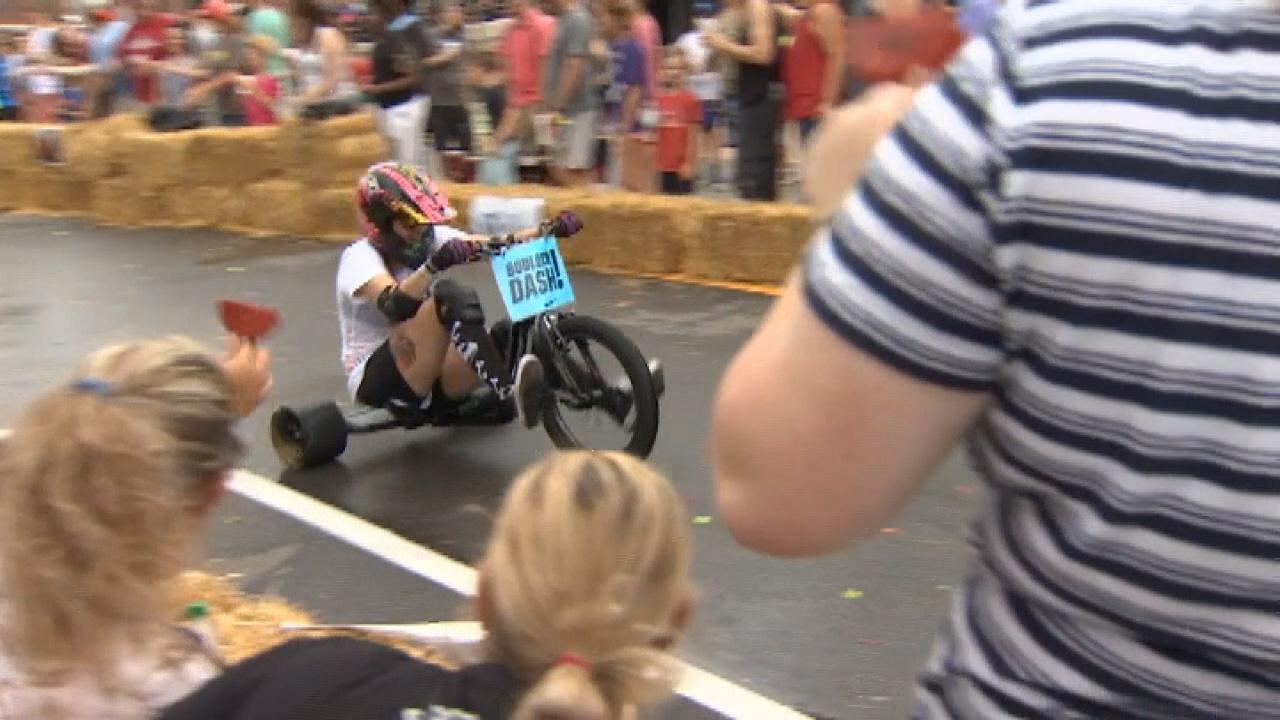 Adult tricycle race brings in crowds of all ages