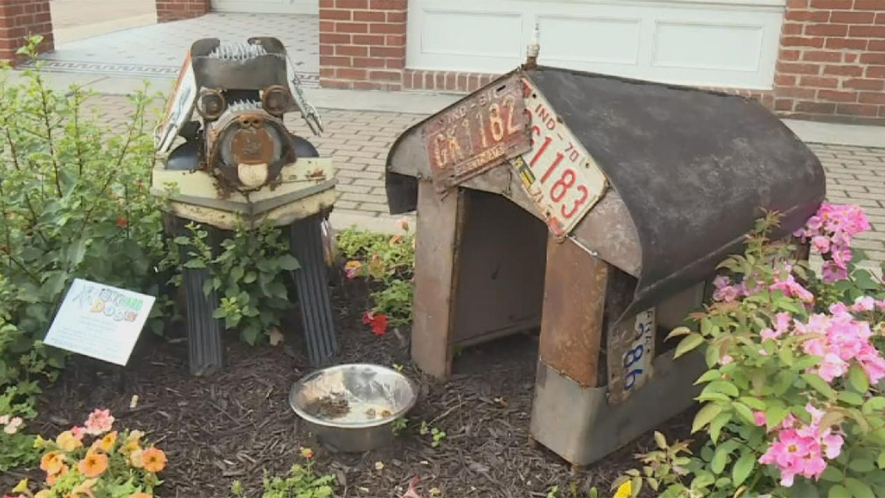 Artists honor junkyard dogs with sculptures crafted from junkyard trash