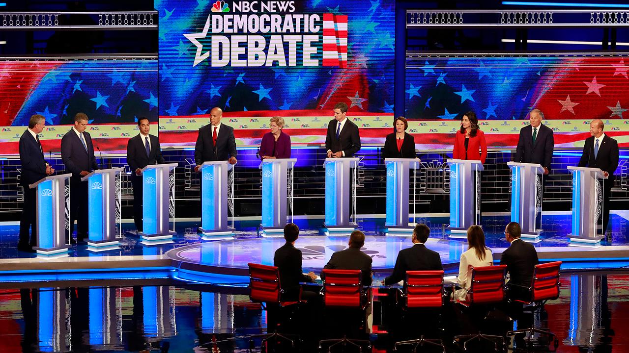 Democratic 2020 hopefuls tout liberal credentials at first presidential debate