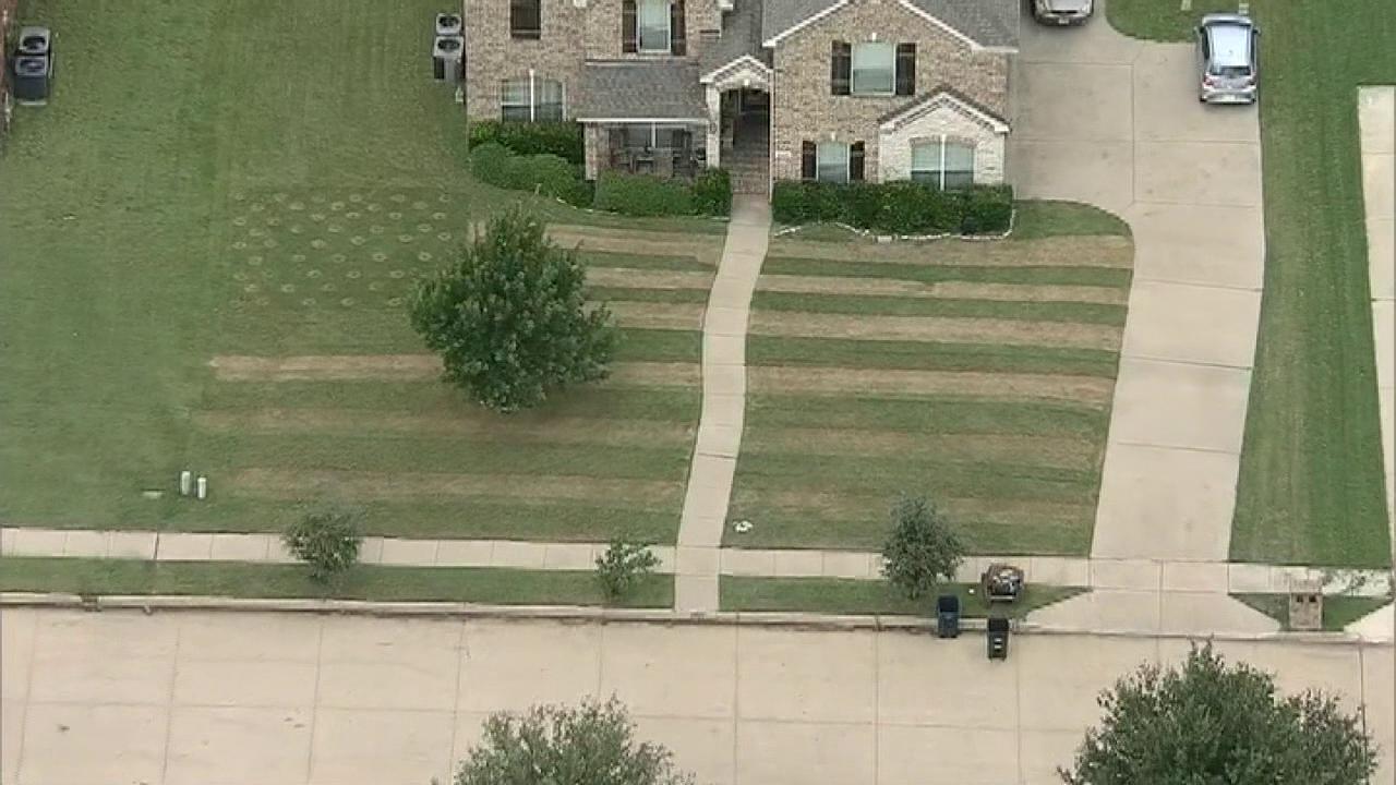 Raw video: Texas man mows American flag into his lawn to raise awareness of veteran suicide