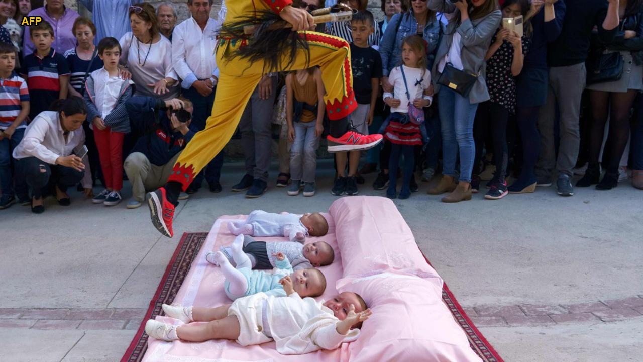 Story behind Spain's bizarre 'baby jumping' festival