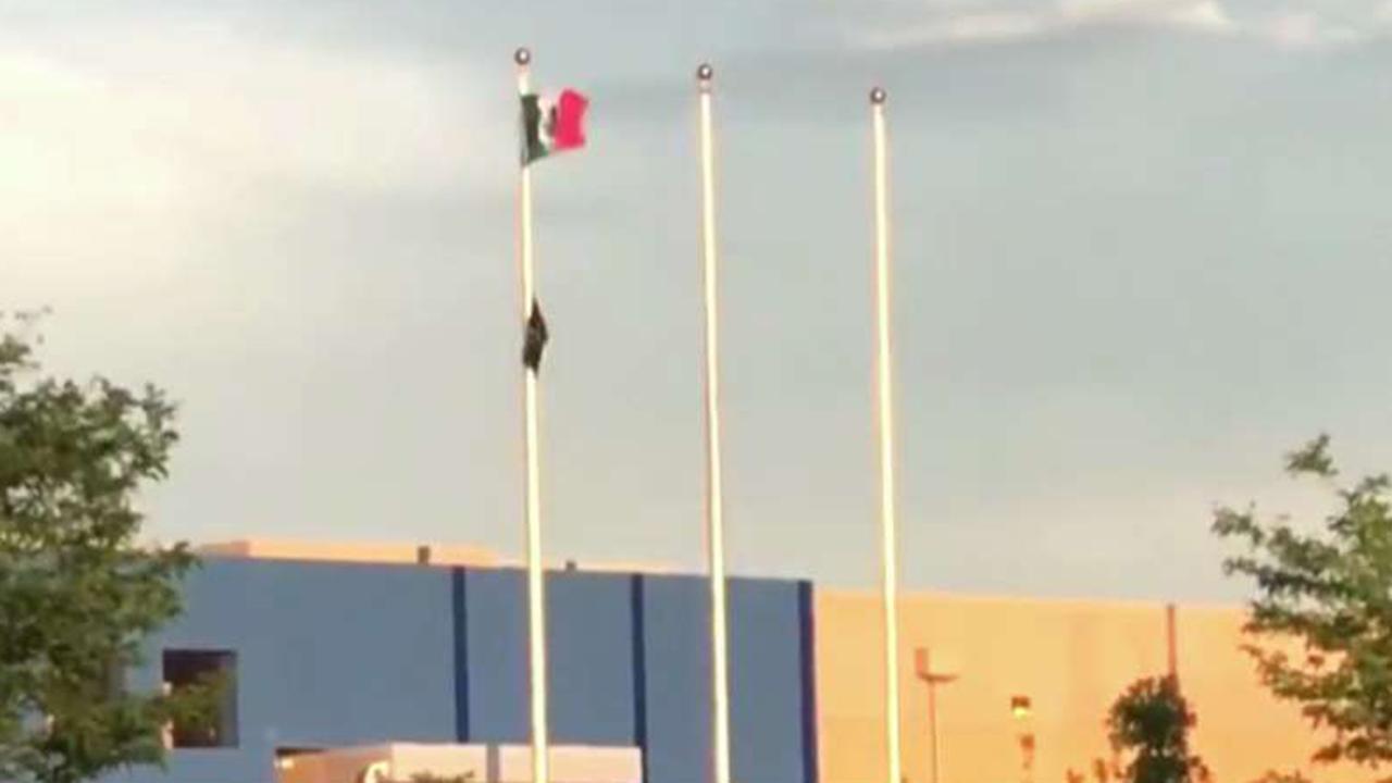 Protesters raise Mexican flag at Colorado ICE facility
