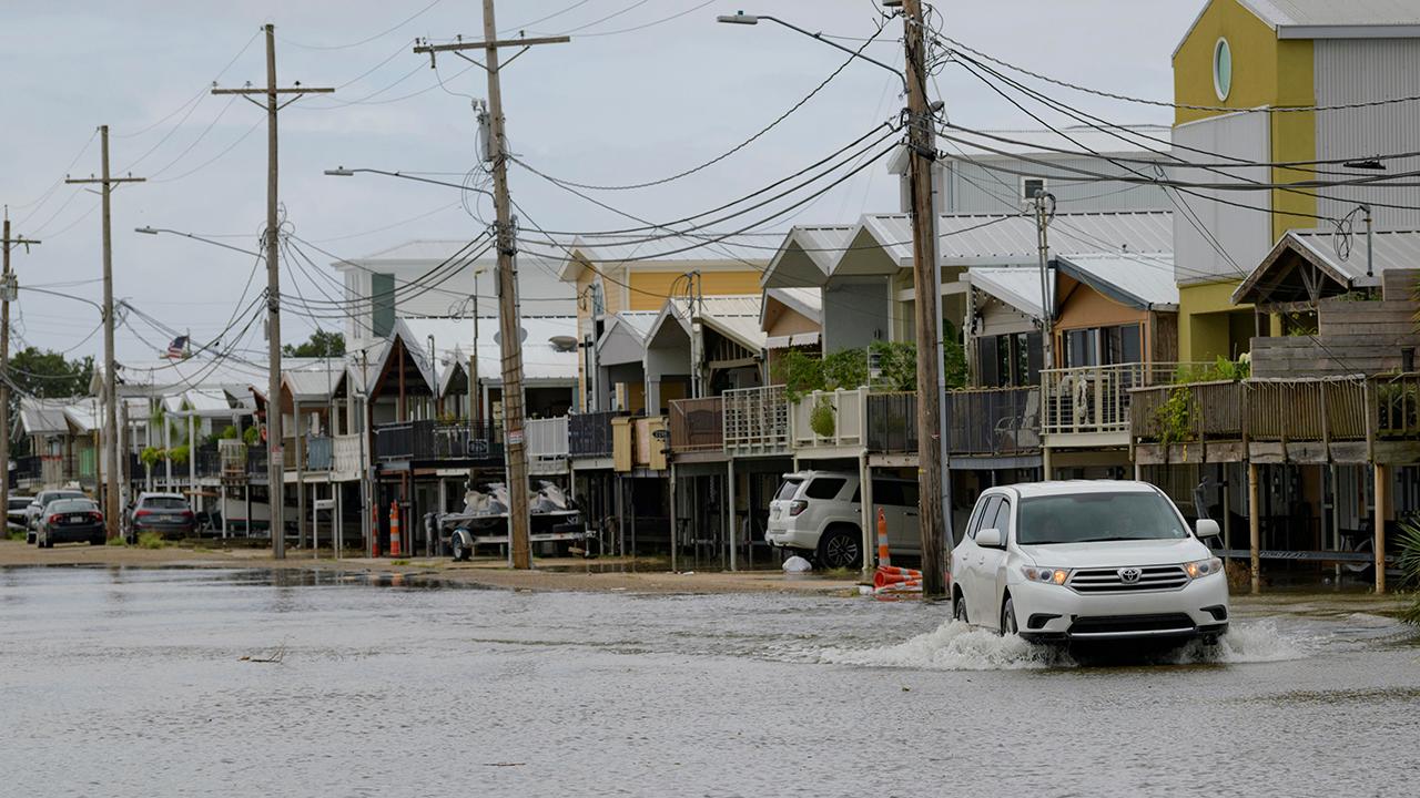 Thousands remain without power with tropical depression Barry moving inland