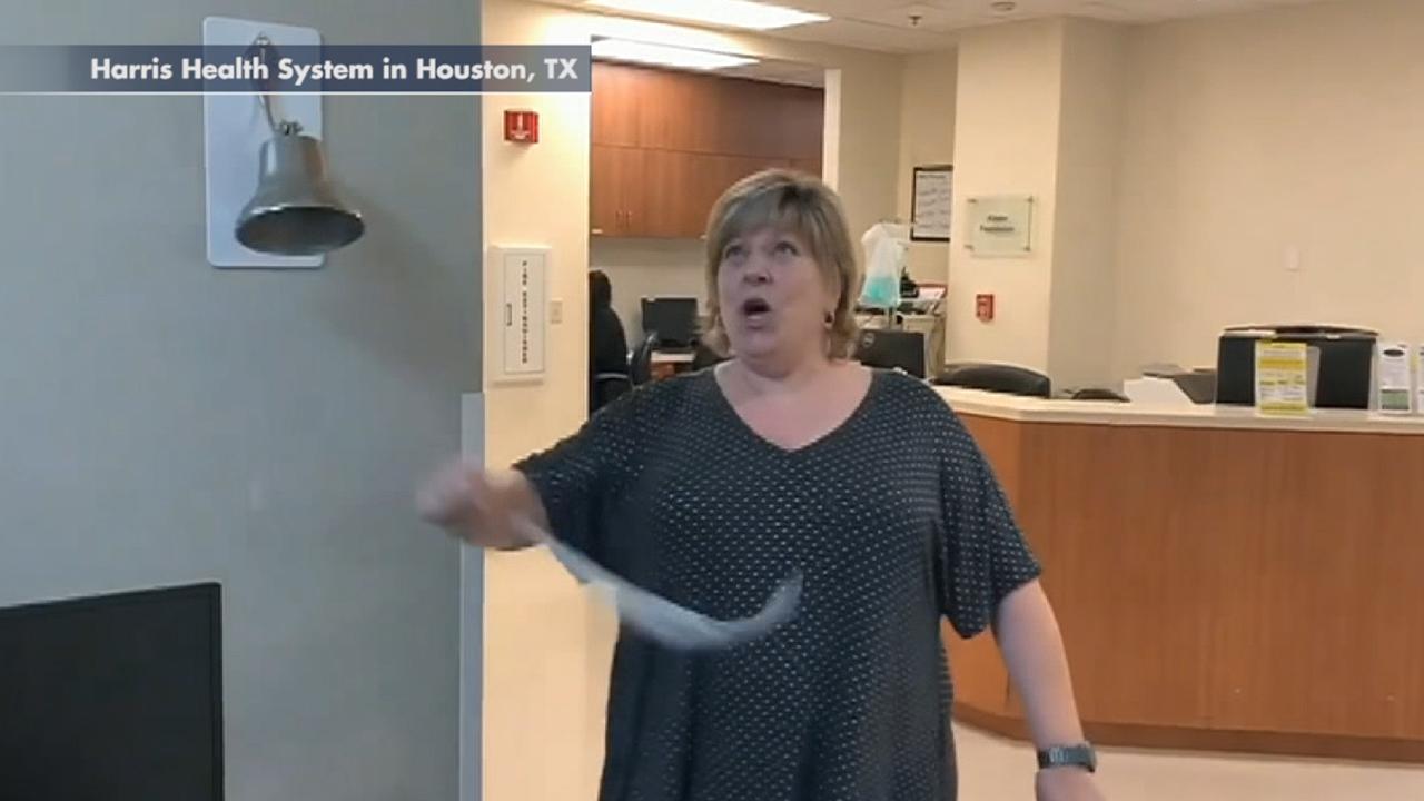 Excited patient breaks 'cancer free' bell after finishing last round of radiation treatment