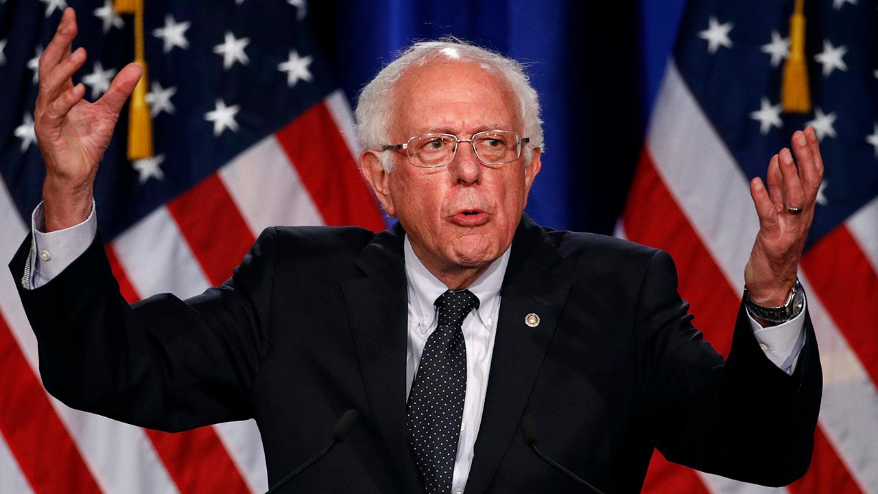 Bernie Sanders under fire from own staff amid push for $15 minimum wage