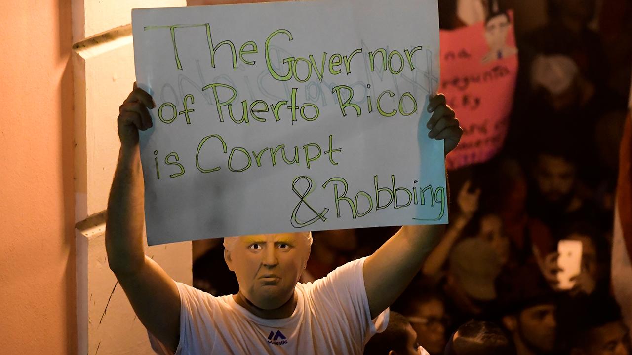 Congressional lawmakers join call for Puerto Rico's governor to resign