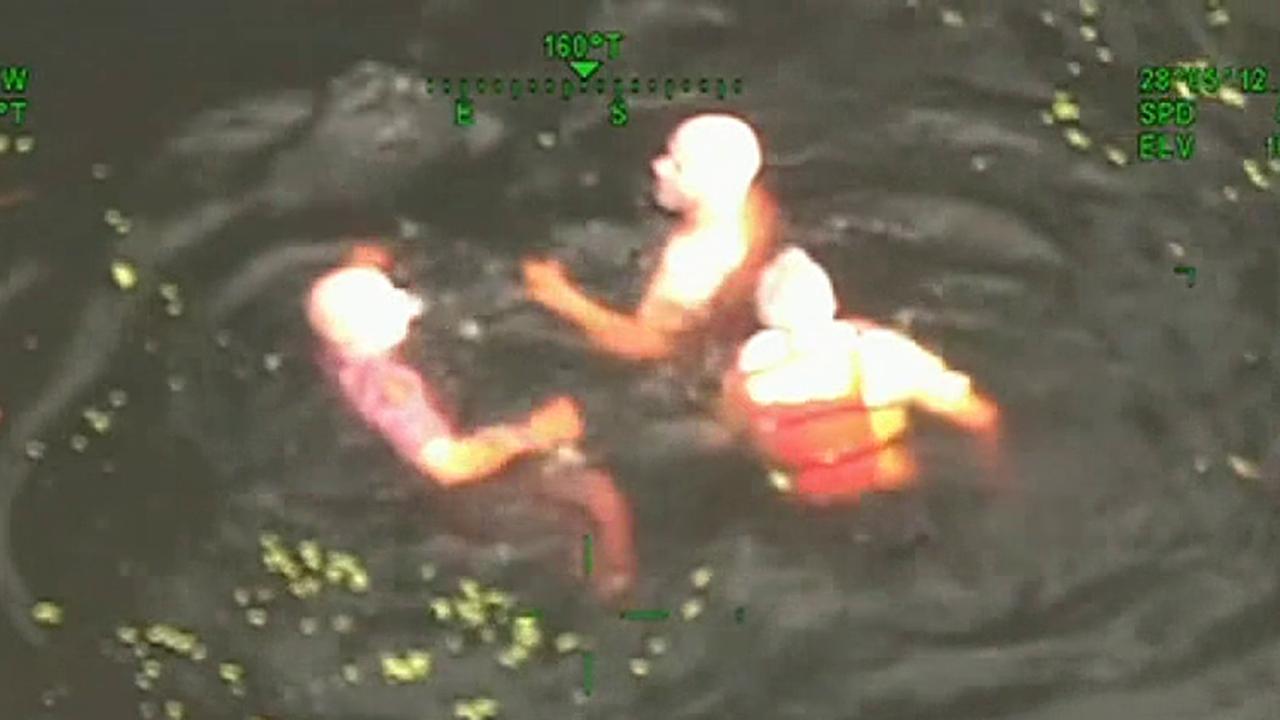 Raw video: Florida officers jump into river in pursuit of suspect