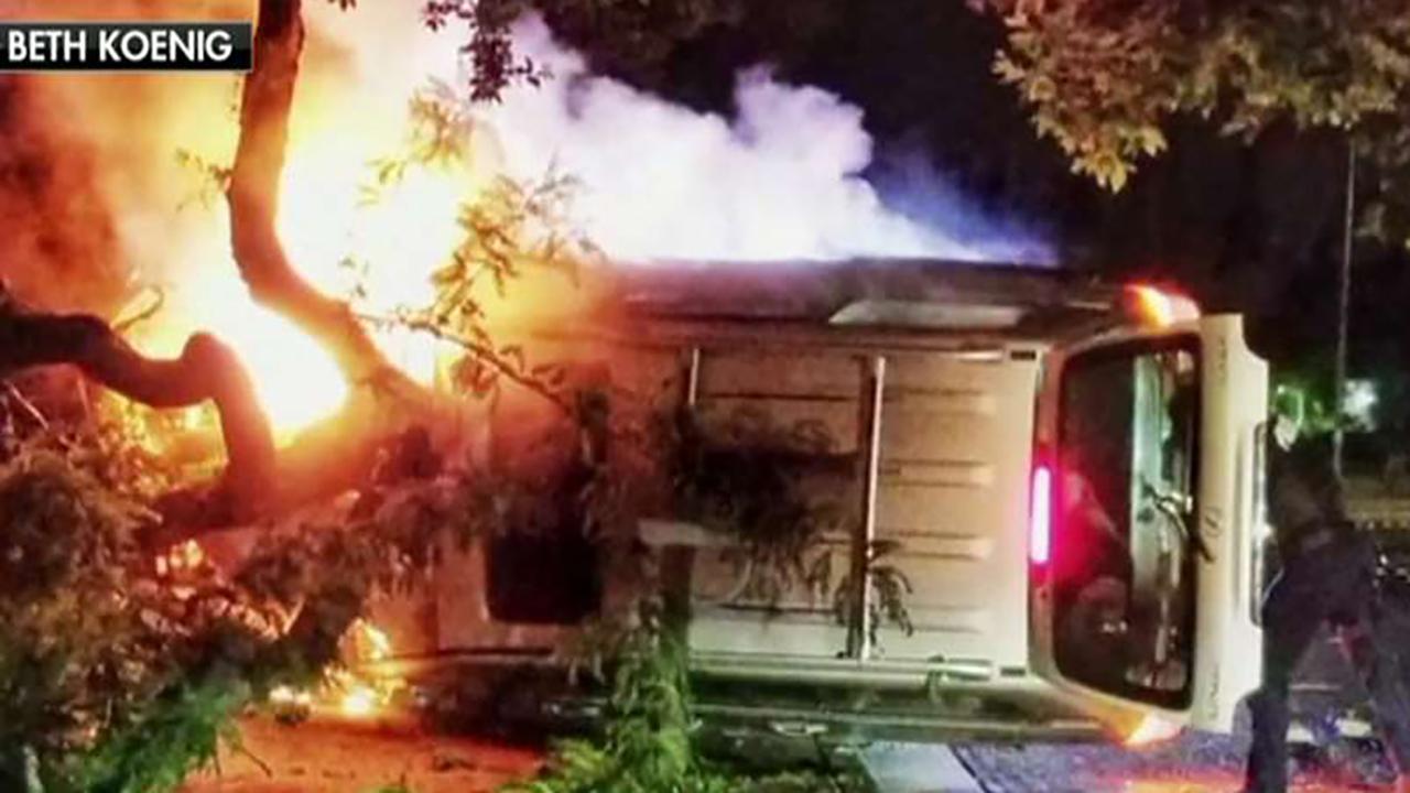 Fremont, California police officer pulls man from burning car