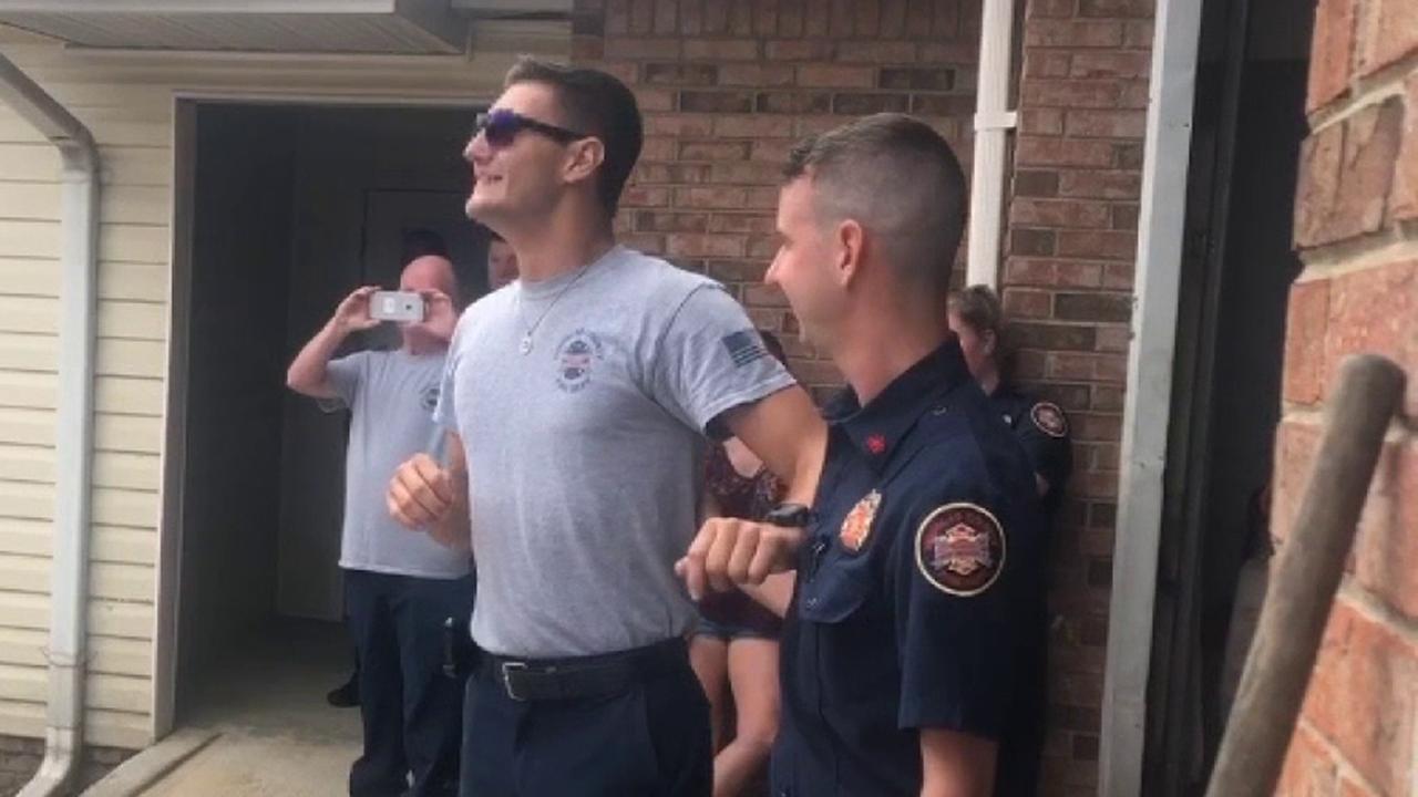 Colorblind firefighter sees colors of the American flag for first time