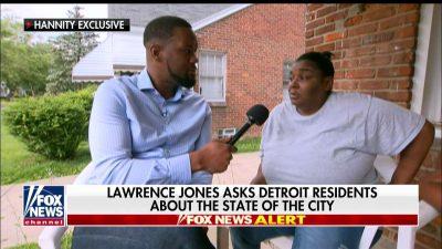 Lawrence Jones talks to Detroit residents