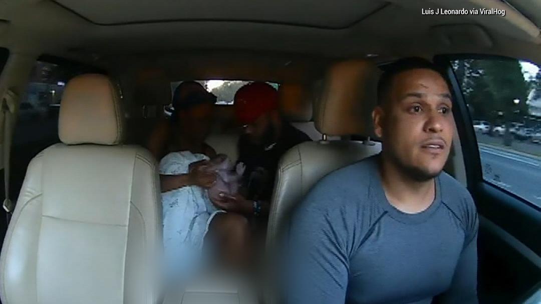 Caught on Video: Baby born in backseat of car on way to hospital