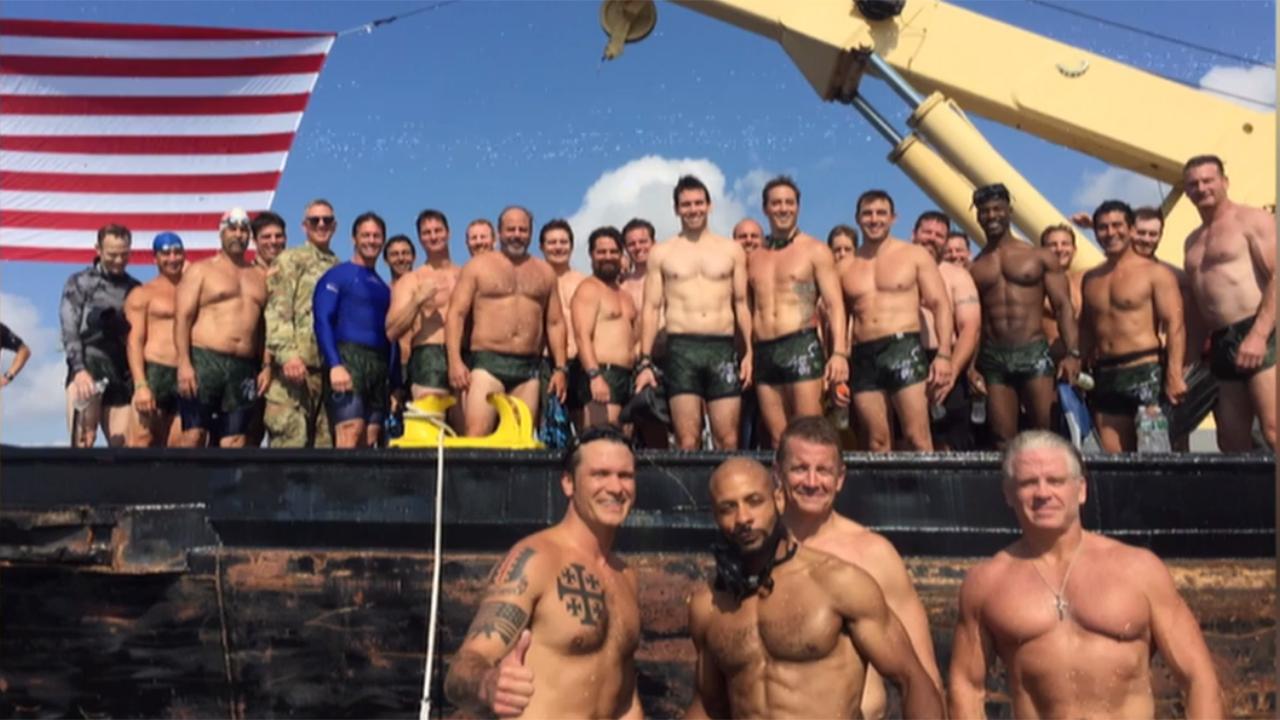 34 current and former Navy SEALs participate in Navy SEAL Hudson River Swim and Run