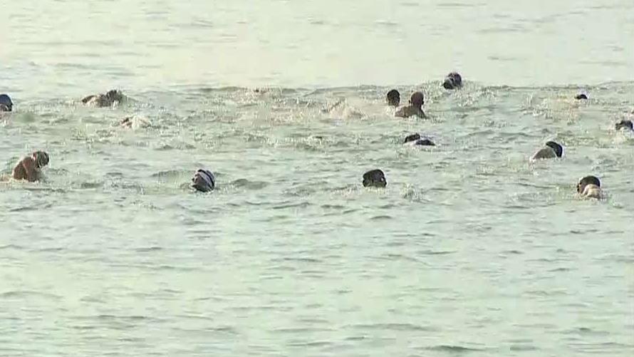 Pete Hegseth joins Navy SEALs in first of its kind Navy SEAL Hudson River Swim and Run