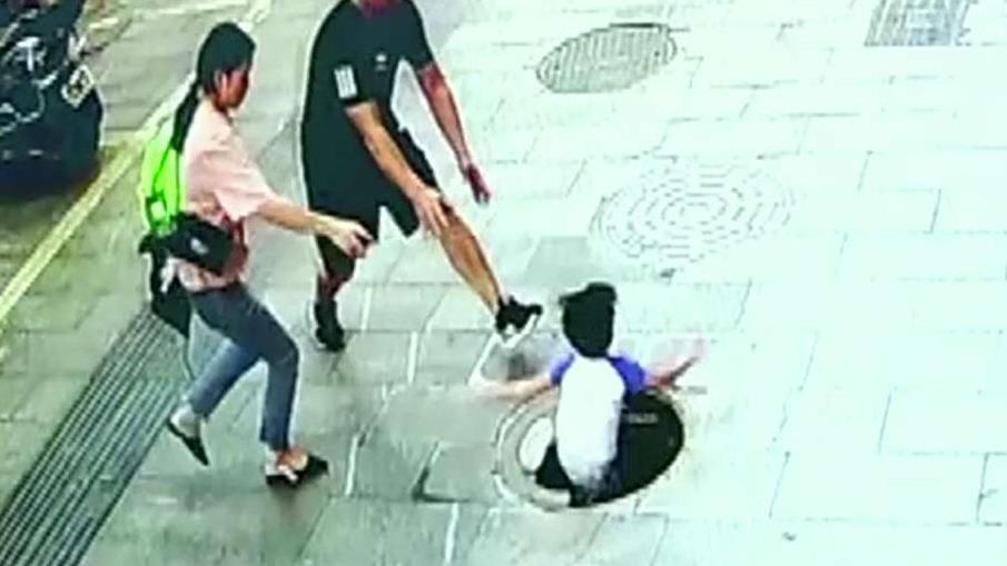 3-year-old falls through manhole in China, dad pulls him out