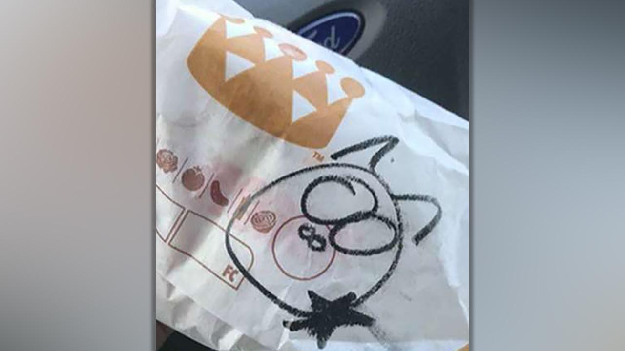 Burger King workers fired after drawing pig on officer's burger wrapper, burning food