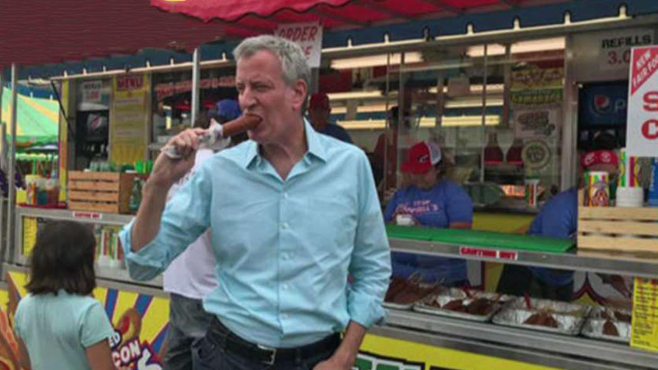 Climate conscious 2020 candidates appeal to the masses by eating corndogs