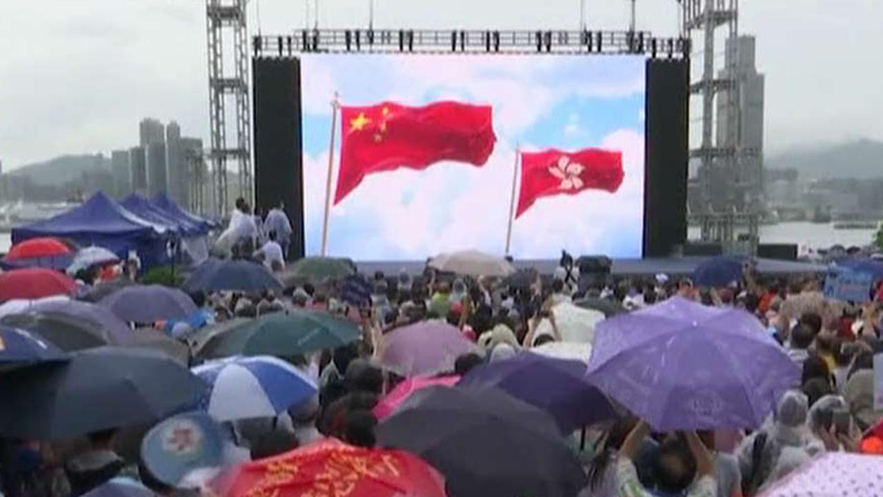 Pro-democracy and pro-government forces stage dueling protests in Hong Kong