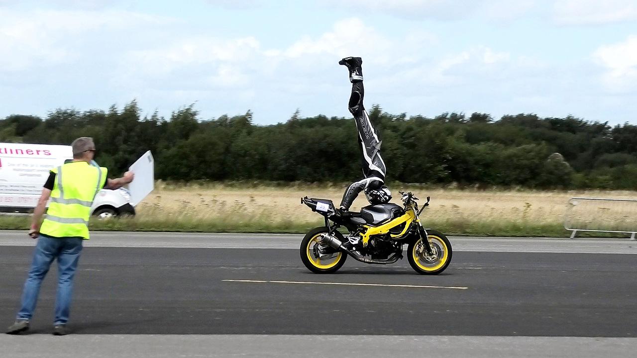 Motorcyclist sets headstand record at 76 mph