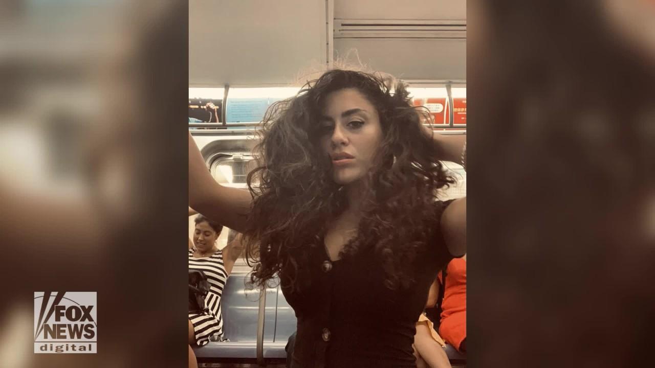 Woman praised after subway photo shoot goes viral: 'She is my new queen'