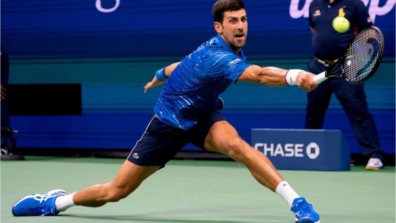 Novak Djokovic booed by crowd after retiring at US Open with bad shoulder