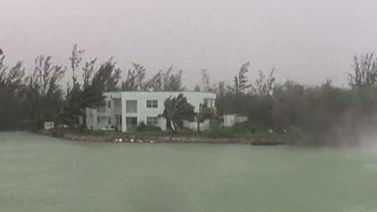Woman riding out Hurricane Dorian says most areas of Grand Bahama are under water