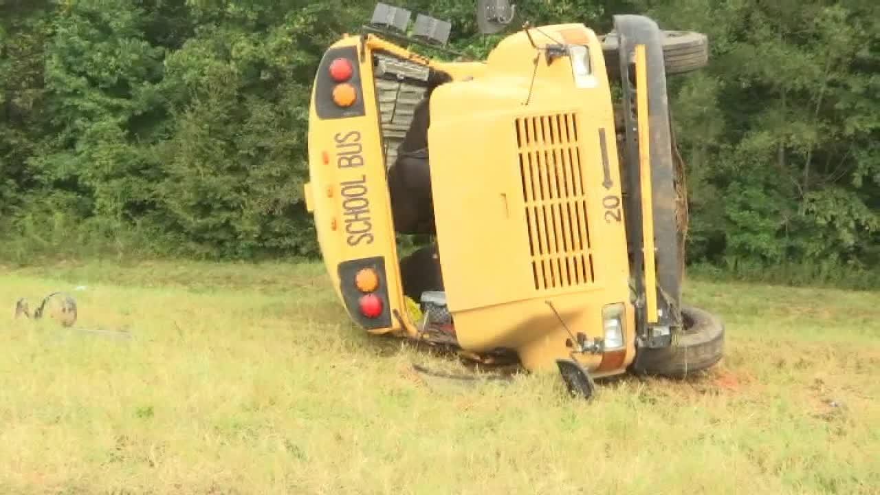 Driver dead in school bus crash, 4 children airlifted from scene
