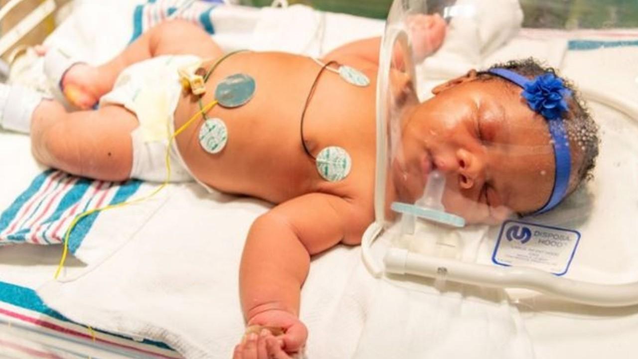 Parents celebrate newborn delivered with some special attachments to September 11th