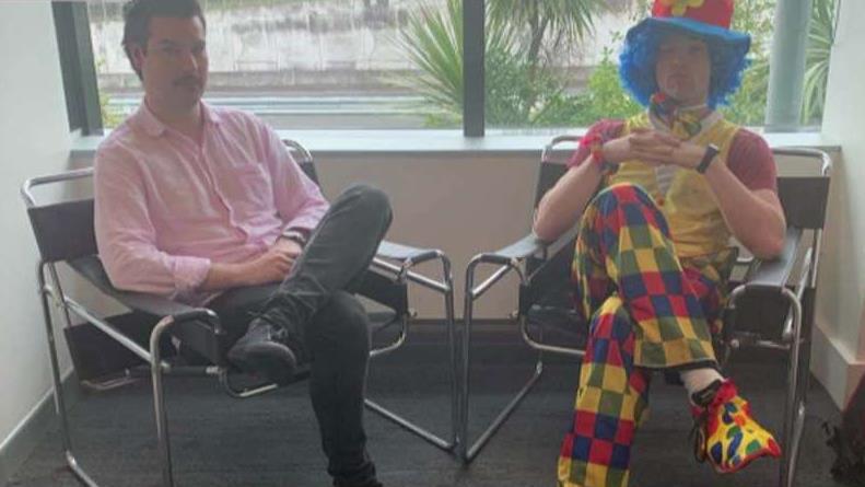 Man brings emotional support clown to work