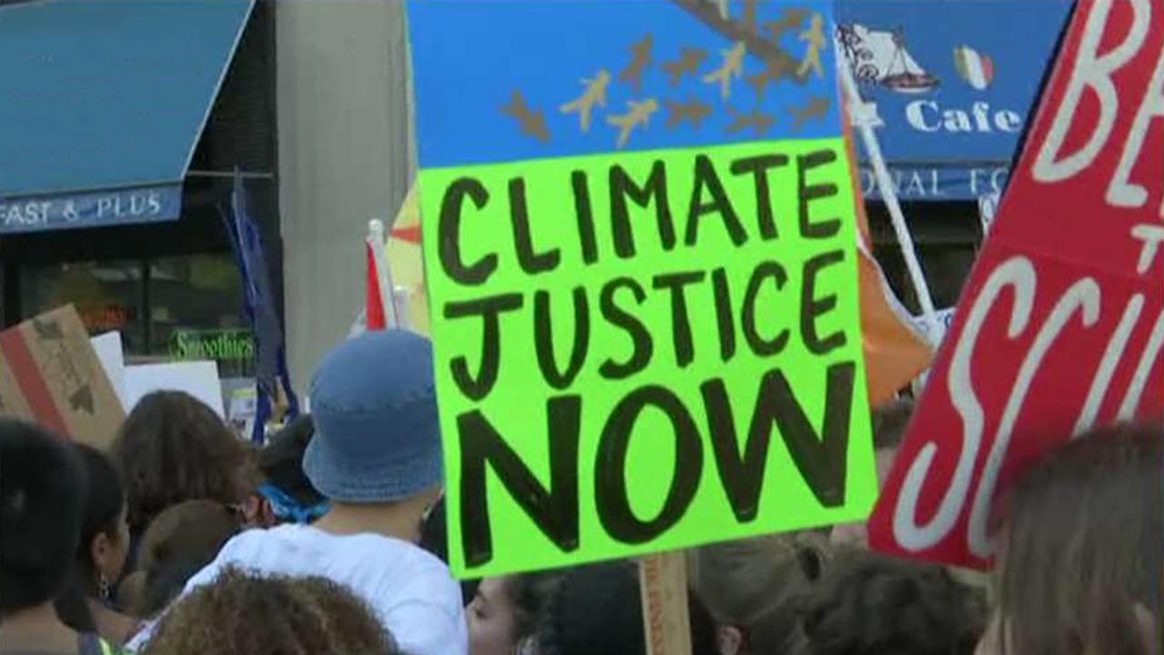 Millions protest climate change