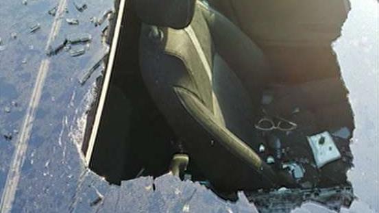 Woman claims dry shampoo bottle explodes, breaks sunroof