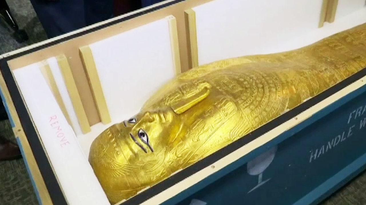 Centuries-old golden coffin is returned to its rightful owners