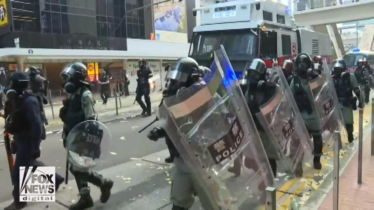 Hong Kong protests become violent as police engage protesters, media
