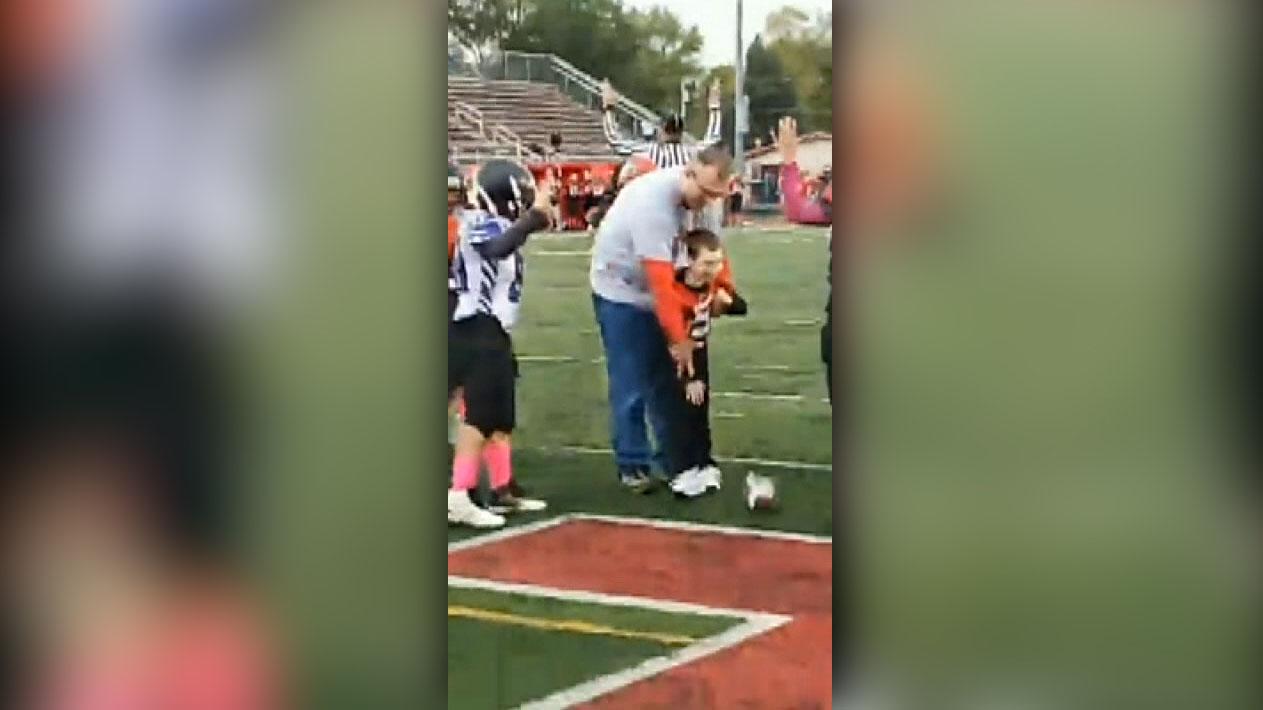 7-year-old boy with cerebral palsy makes honorary football captain for a day