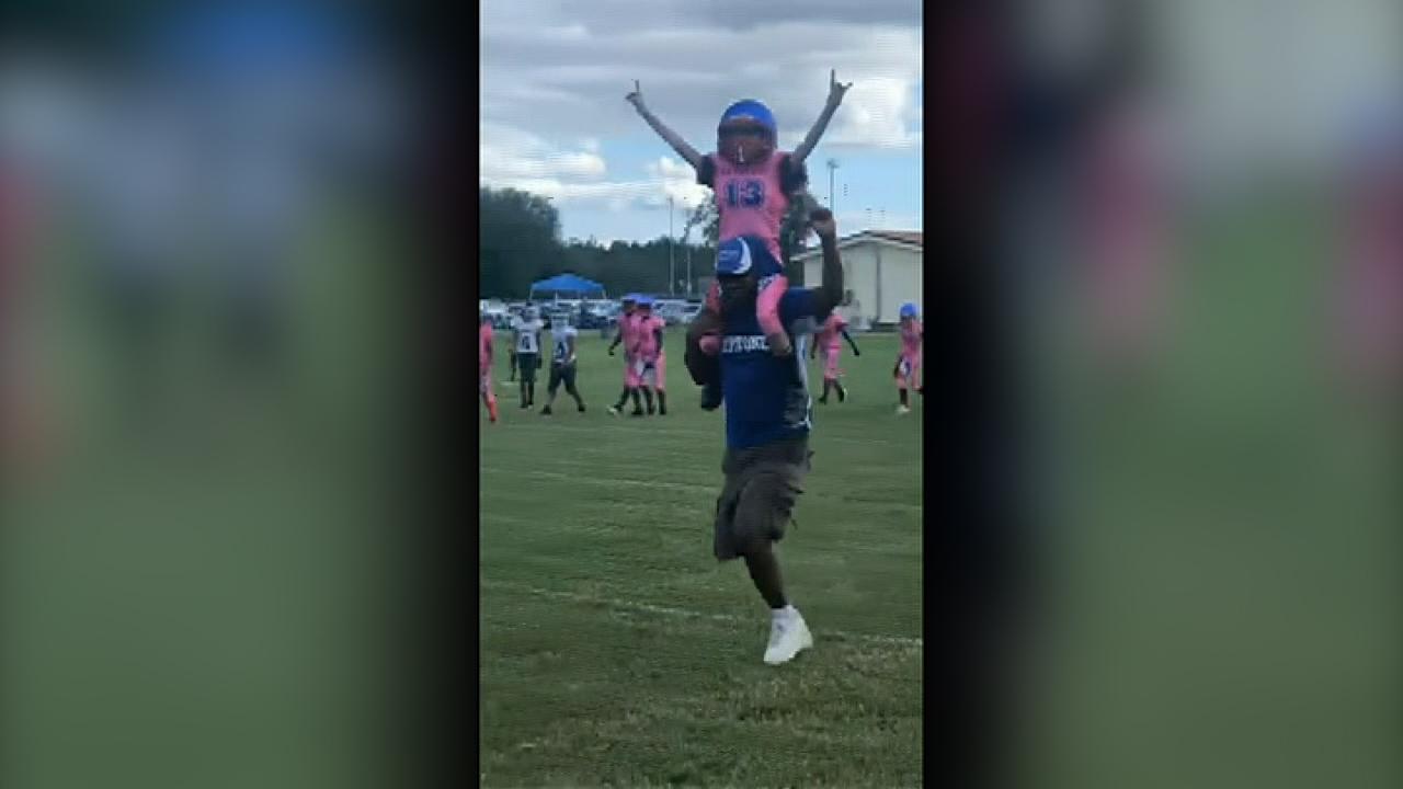 Child with heart disease scores first touchdown
